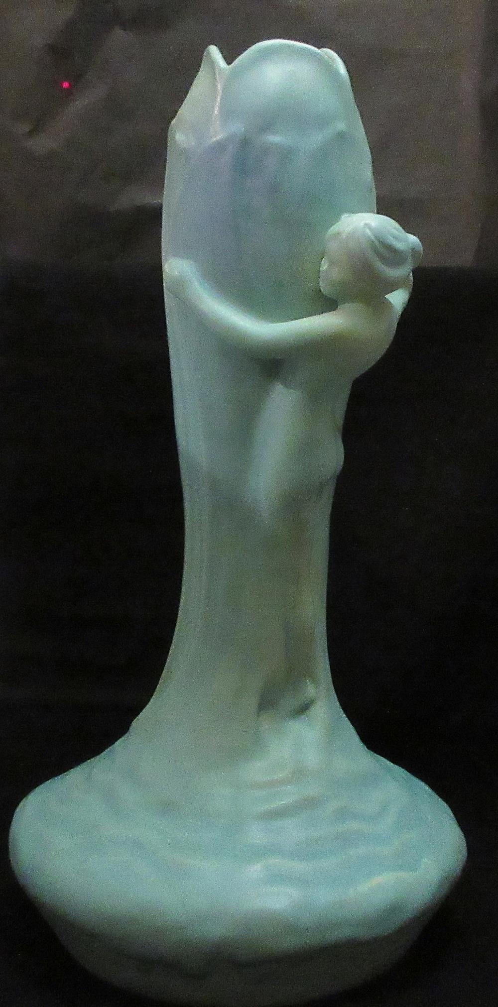 Beautiful Van Briggle art pottery vase with full: Beautiful Van Briggle art pottery vase with full standing nude. In very good as found condition. Beautiful color. Great quality and detail Measures approx.. 19 ½” tall x 8 ¼” wide at base