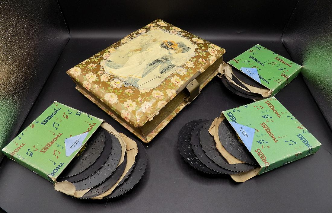 Unusual Victorian Photo album -music box: Unusual Victorian Photo album -music box. With three boxes of Thorens discs. Made in Switzerland. In very good original as found condition. Some wear around corner of album, normal from use and age. G