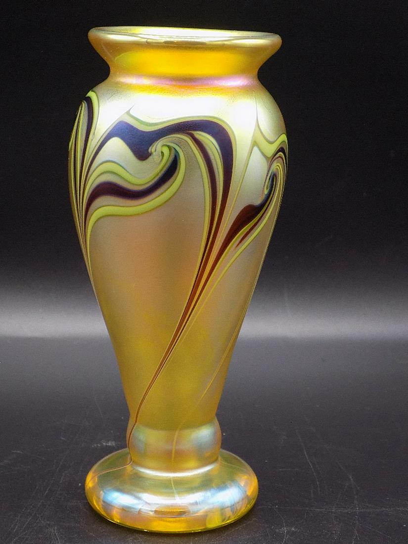 Lovely signed Orient and Flume art glass vase: Lovely signed Orient and Flume art glass vase. Beautiful iridescence and feather pulled decoration. In very good original as found condition. Great quality and detail. Measures approx. 6 1/8” tall x