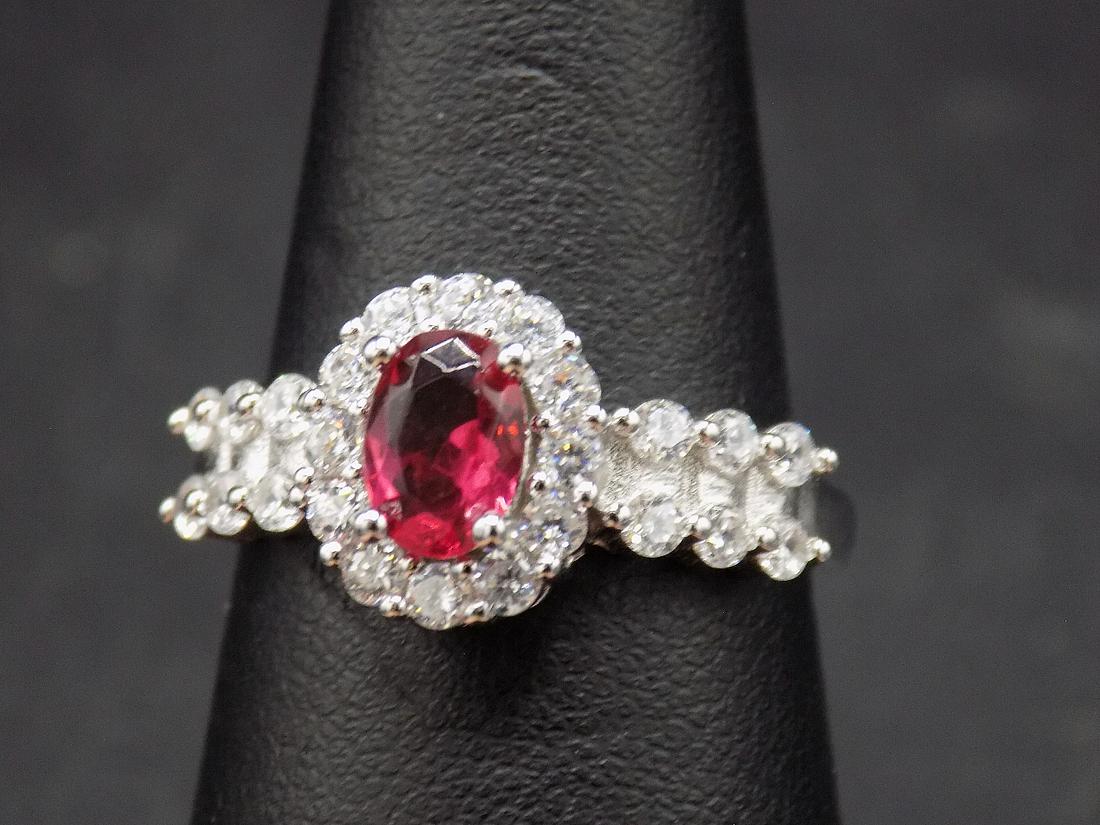 Beautiful approx. 2 cwt. ruby and topaz sterling: Beautiful approx. 2 cwt. ruby and topaz .925 sterling silver ring. Lab created. In very good original as found condition. Beautiful colors. Size 8
