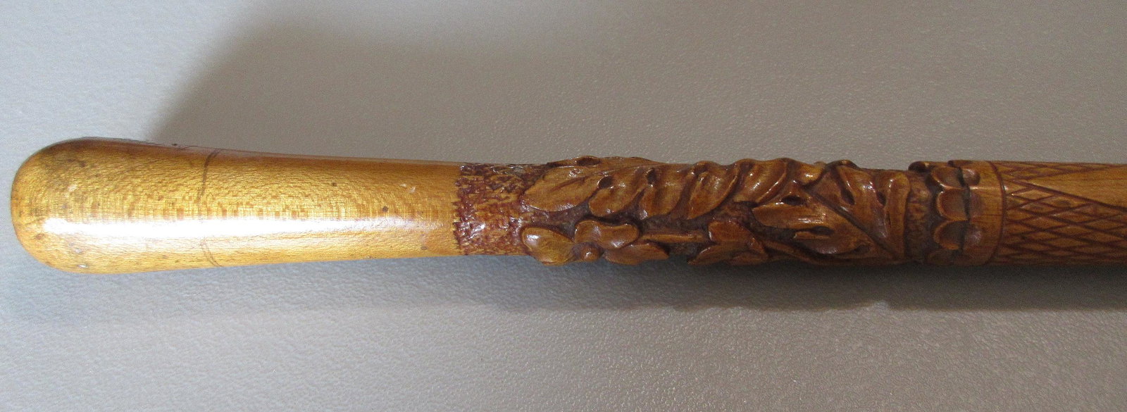 Fabulous vintage carved floral pointer with mother of: Fabulous vintage carved floral pointer with mother of pearl knob. In very good original as found condition. Great quality and detail. Measures 42”.