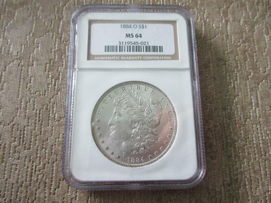 Graded NGC 1884 O MS64 Morgan silver dollar. (1 of 3)