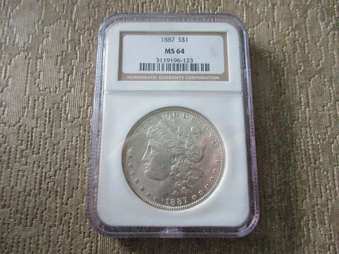 Graded NGC 1887 MS64 Morgan silver dollar (1 of 3)