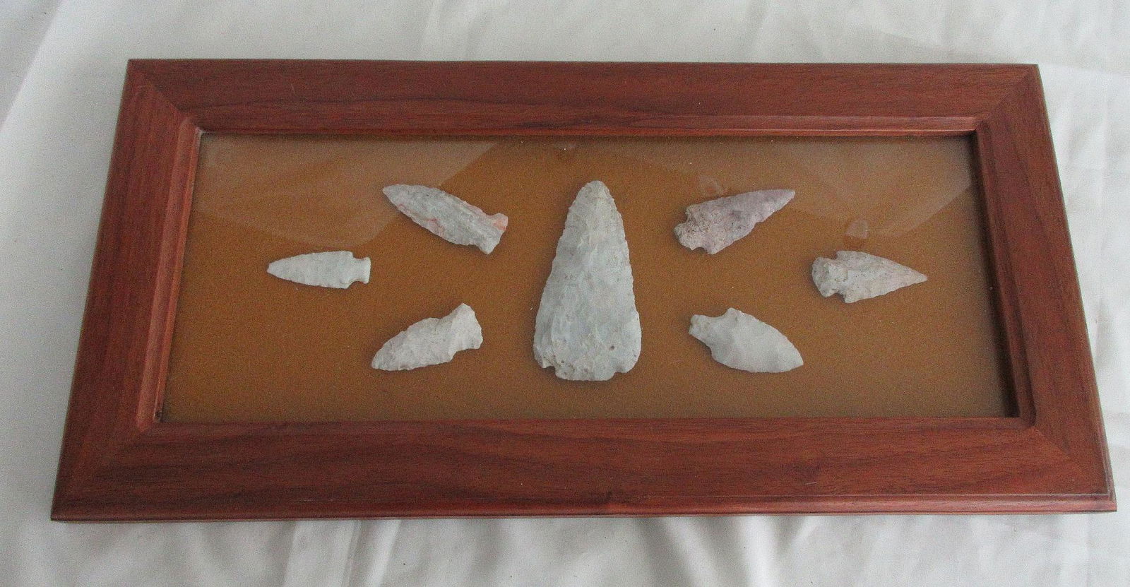 Display of seven Native American Indian arrowheads (1 of 6)