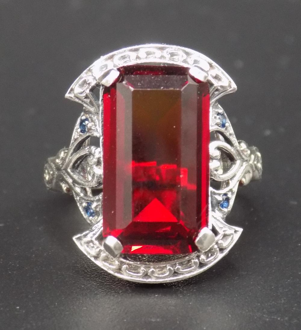Beautiful approx. 10 cwt. ruby & sapphire .925: Beautiful approx. 10 cwt. ruby & sapphire .925 sterling silver ring. Lab created. Beautiful color & detail. Size 5 ¾