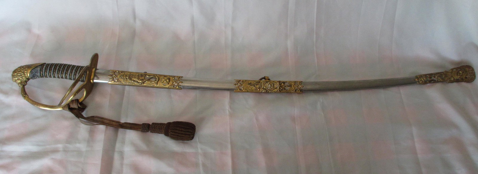 Fabulous engraved sword by M C Lille & Co. Columbus,: Fabulous engraved sword by M C Lille & Co. Columbus, Ohio. Fancy engraved blade with name engraved W C Schlapkohl as shown in photos. Fabulous quality and detail. Has a fancy scabbard. Please use phot