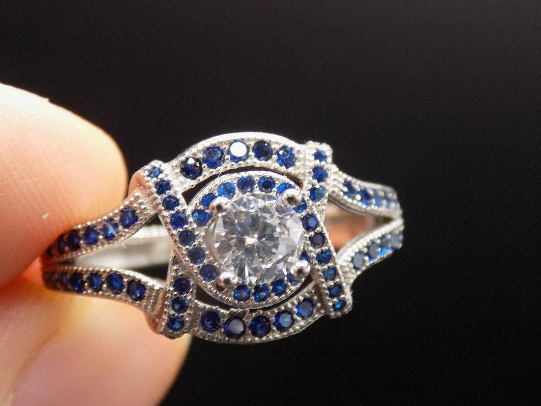 Beautiful approx. 2cwt. topaz & sapphire .925: Beautiful approx. 2cwt. topaz & sapphire .925 sterling silver ring. Lab created. Beautiful color & detail. Size 8