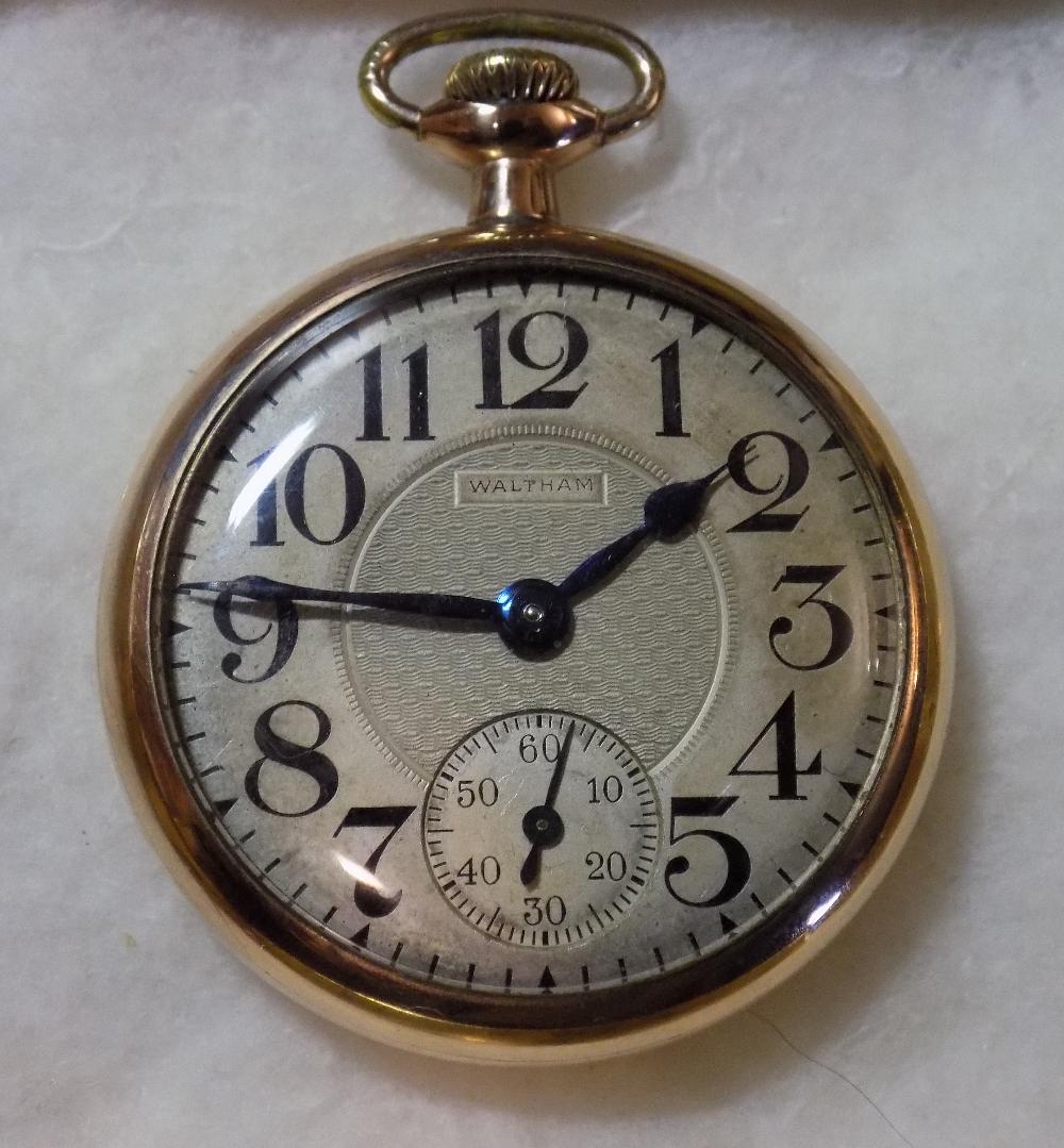 Vintage Waltham 21j 645 railroad grade pocket watch.: Vintage Waltham 21j 645 railroad grade pocket watch. Metal dial. Running. Lever set. Gold Fill. Please see photos for more details and serial number on works. Dial measures 1 5/8