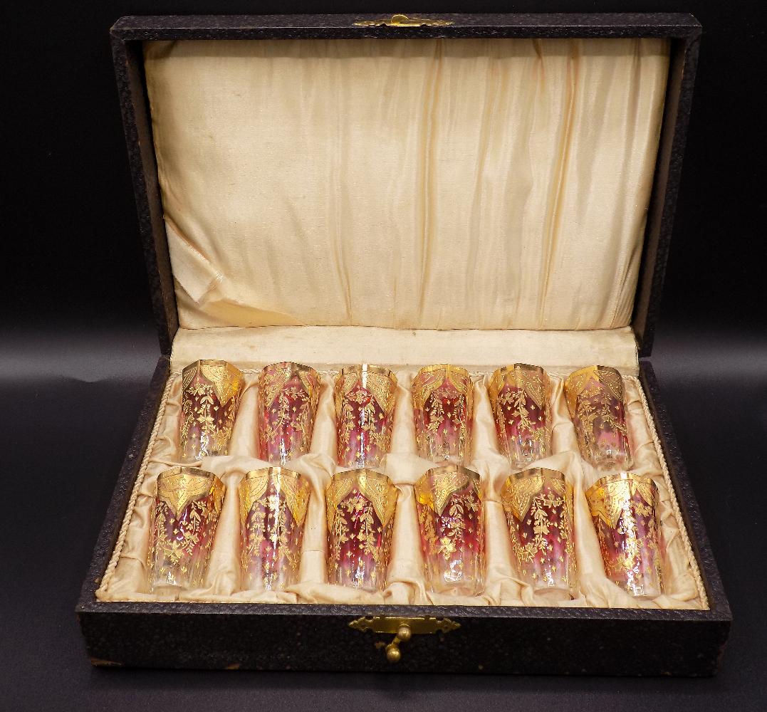 Magnificent set of Moser decorated art glass glasses in: Magnificent set of Moser decorated art glass glasses in original box. 12 glasses. Made late 1800’s. Contained in a original custom fitted leather covered silk lined case. Beautiful colors. Great