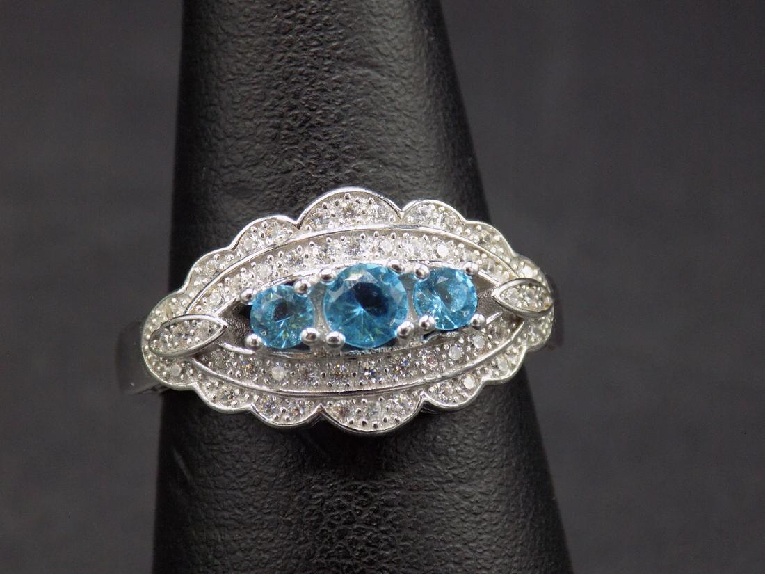 Beautiful approx. 3 cwt. aquamarine & topaz .925: Beautiful approx. 3 cwt. aquamarine & topaz .925 sterling silver ring. Beautiful color & detail. Size 8