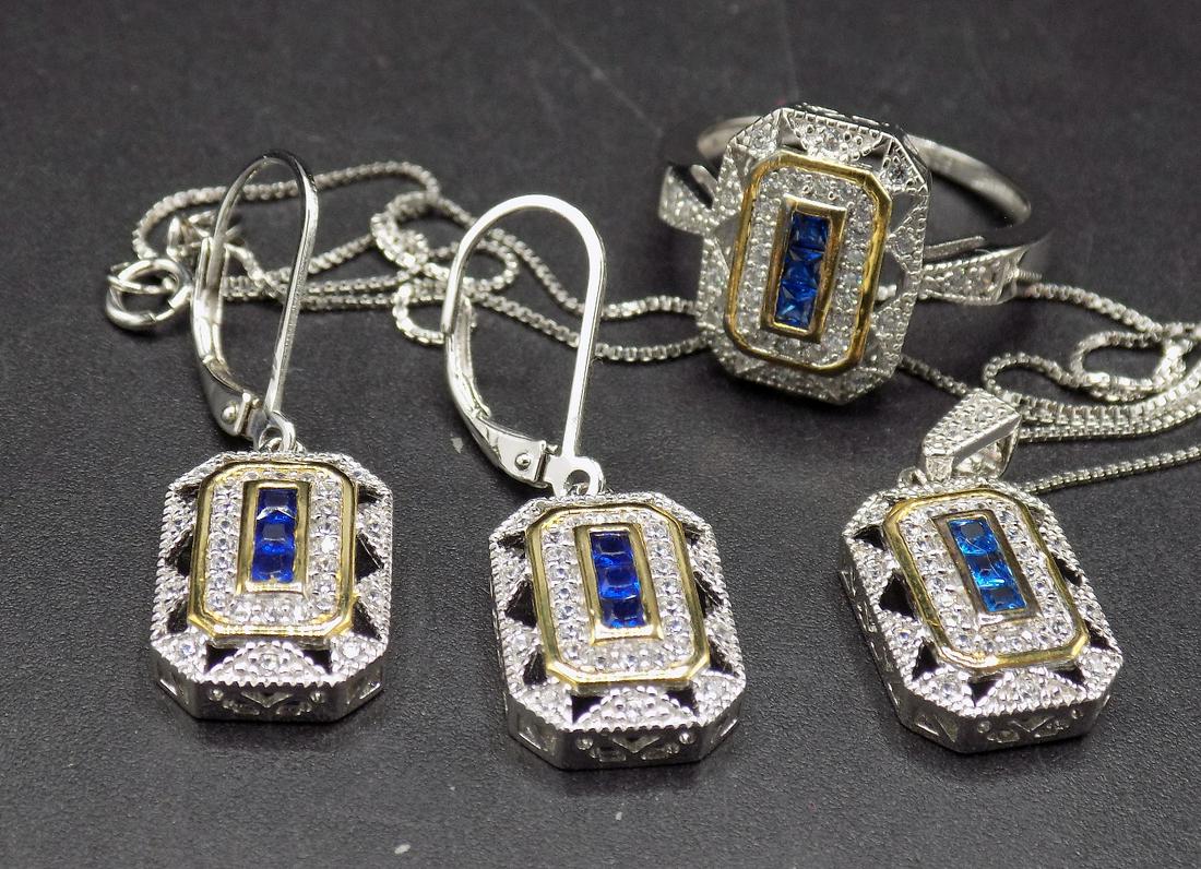 Beautiful sapphire & topaz 3-piece jewelry set. .925: Beautiful sapphire & topaz 3-piece jewelry set. .925 sterling silver. Size 8 ring. 5/8” earrings. Necklace chain approx. 18”, & 5/8