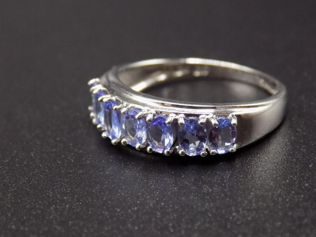 Beautiful tanzanite gold fashion ring: Beautiful tanzanite gold fashion ring. Beautiful color. Great quality and detail. Please see certified appraisal for more details. Size 7