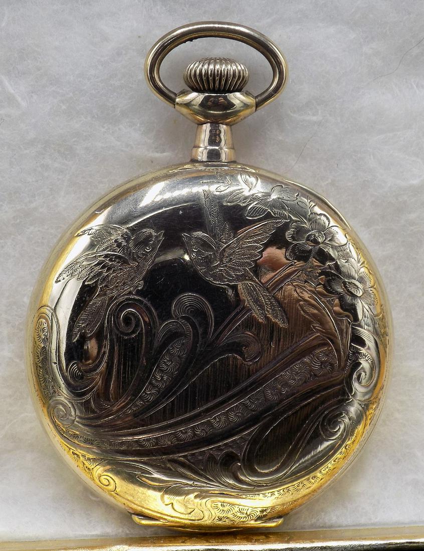 Fancy vintage hunting case pocket watch: Fancy vintage hunting case pocket watch. Porcelain dial marked Eastman. Running. Lever set. Gold Fill. Please see photos for more details and serial number on works. Dial measures 1 ¼