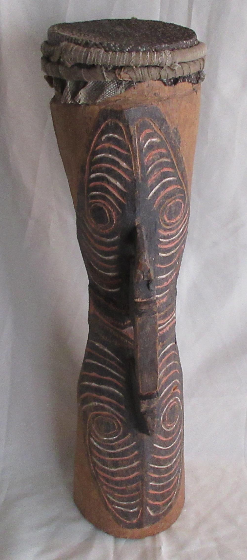 Nice vintage hand made African drum: Nice vintage hand made African drum. In very good as found condition. Hand painted. Nice decoration in carving. Measures 22 ½”.