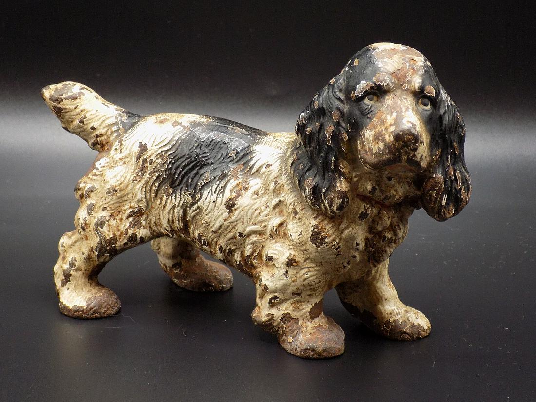 Cute vintage cast iron Spaniel dog doorstop: Cute vintage cast iron Spaniel dog doorstop. Probably Hubey. In very good original as found condition. Very heavy cast iron. Original paint with wear as shown in photos. Made Late 1800’s to earl