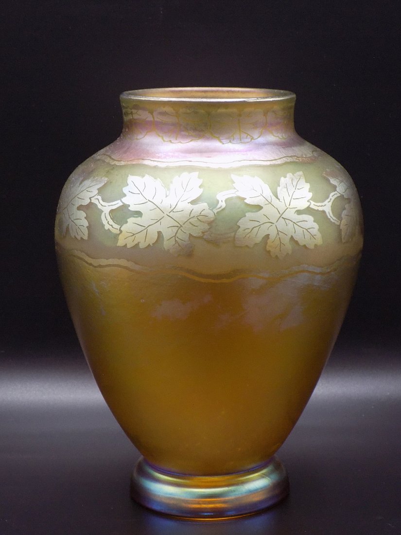 Magnificent Tiffany intaglio cut art glass vase: Magnificent Tiffany intaglio cut art glass vase. Signed on bottom as shown in photos. Beautiful colors with great quality and detail. No condition problems. Measures 8 ½ inches tall.