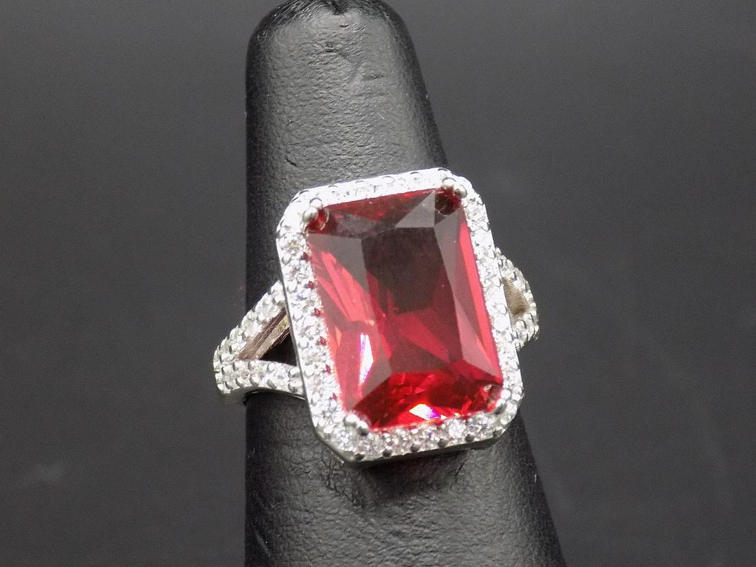 Beautiful 8 cwt. ruby and topaz .925 sterling ring. (1 of 3)