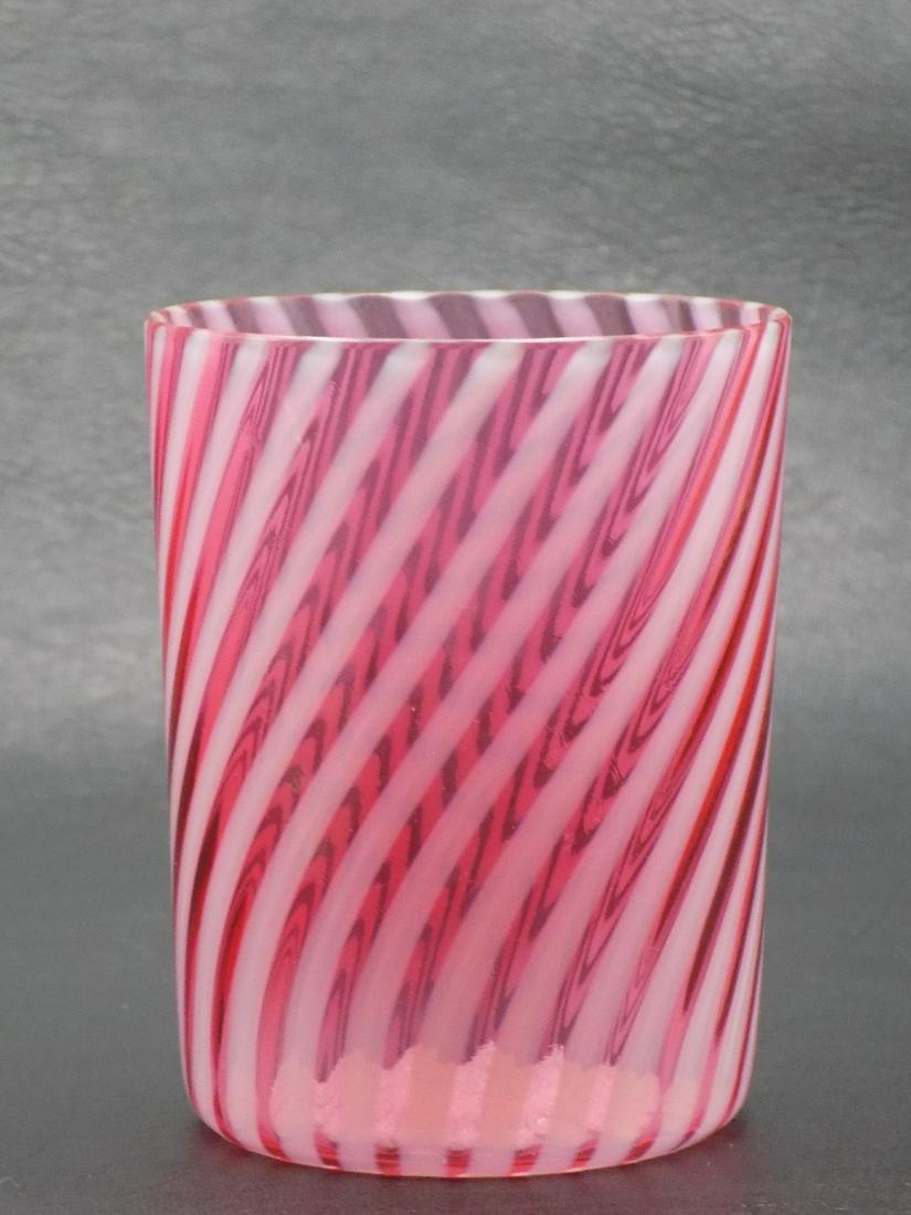 Very nice Victorian cranberry swirl art glass tumbler: Very nice Victorian cranberry swirl art glass tumbler. Beautiful swirl design. In very good as found condition. 3 5/8” tall x 2 ¾” wide