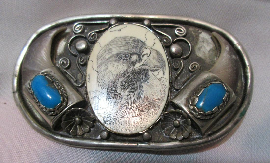 Exceptional vintage Native American Indian belt buckle: Exceptional vintage Native American Indian belt buckle. Scrimshaw eagle and turquoise. In very good original as found condition. Beautiful colors and detail. 3 3/8” x 2” tall