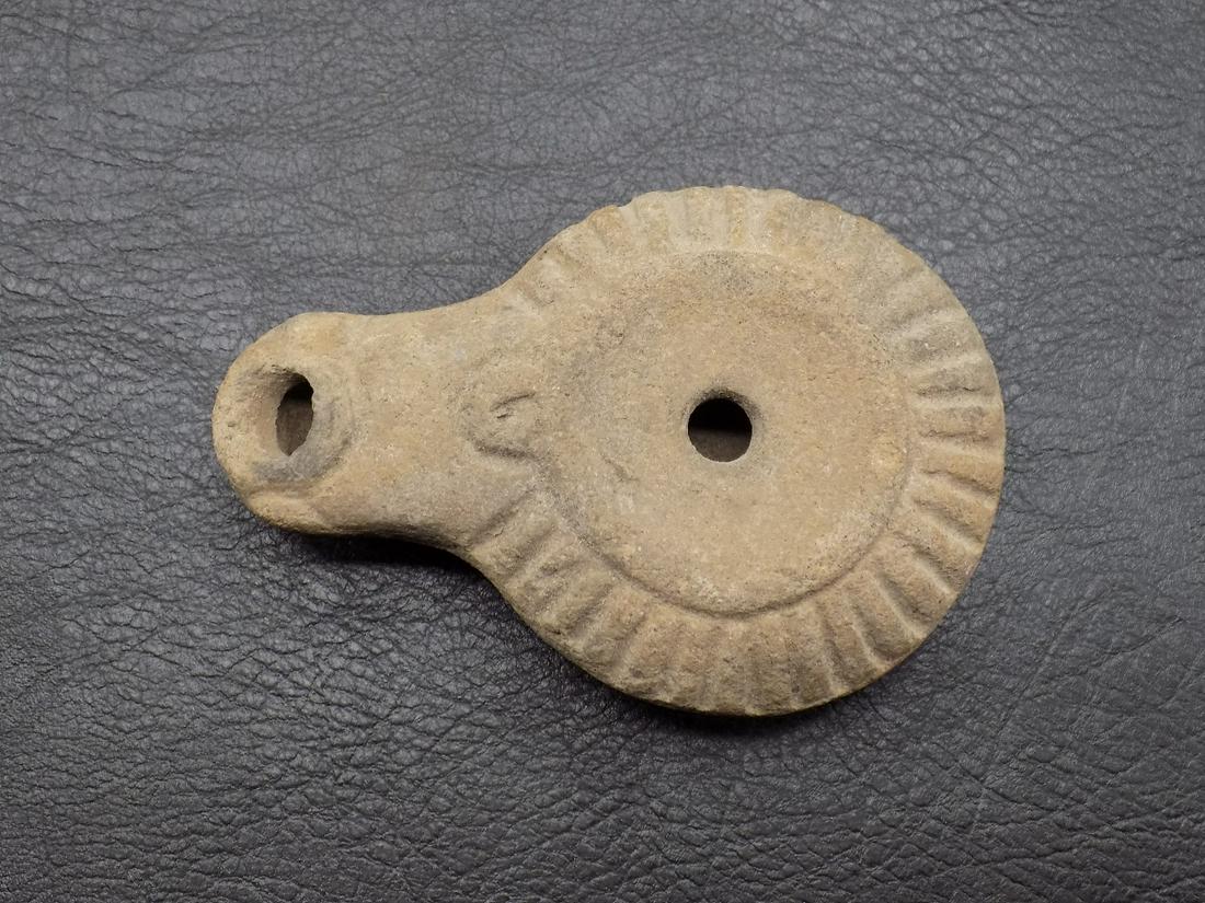 Handmade Byzantine style terracotta or clay oil lamp: Handmade Byzantine style terracotta or clay oil lamp. Please see photos to judge age and condition. Clay is darker than shown in photo. 3 ½” long x1” tall