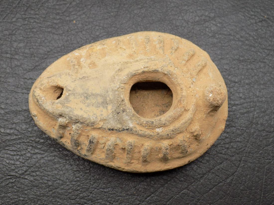 Handmade Byzantine style terracotta or clay oil lamp: Handmade Byzantine style terracotta or clay oil lamp. Please see photos to judge age and condition. Clay is darker than shown in photo. 3 ¼” long x1 ¼”tall