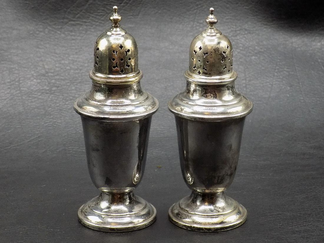 Vintage Gorham pair of sterling salt & pepper shakes: Vintage Gorham pair of sterling salt & pepper shakes. Great quality & detail. In very good original as found condition. Marked on bottom as shown in photo. 4 ½ inches tall. 78 grams