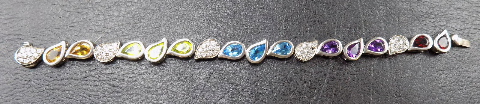 Beautiful garnet, amethyst, aquamarine, peridone, citrine sterling silver bracelet (1 of 4)