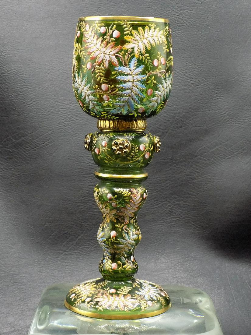 Fabulous antique Moser art glass wine goblet: Fabulous antique Moser art glass wine goblet. Very highly decorated as shown in photos. Beautiful colors. In very good original as found condition. 7 ½ inches tall x 2 7/8 inches at bottom