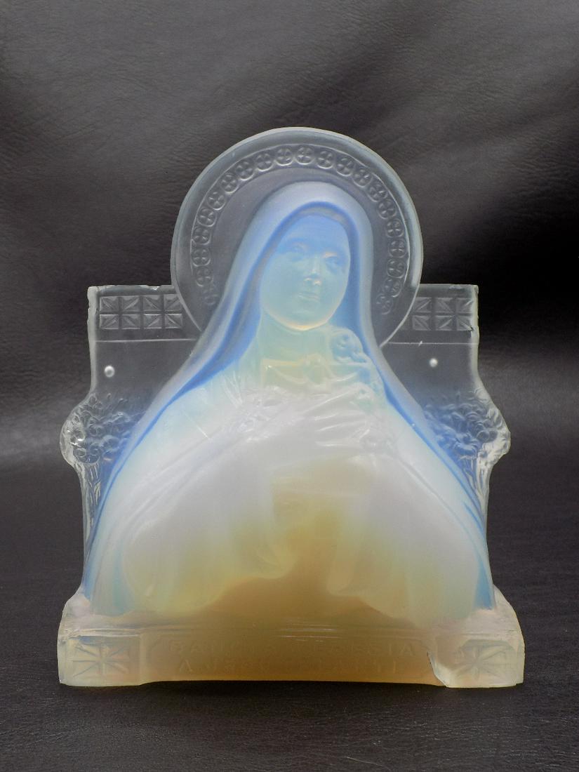 Pretty vintage Sabino art glass religious figure of Sancta Teresia: Pretty vintage Sabino art glass religious figure of Sancta Teresia. Beautiful opalescence. Great quality & detail. Marked on base as shown in photo. Small fleabites on base as shown in photo. 5 7/8 ta