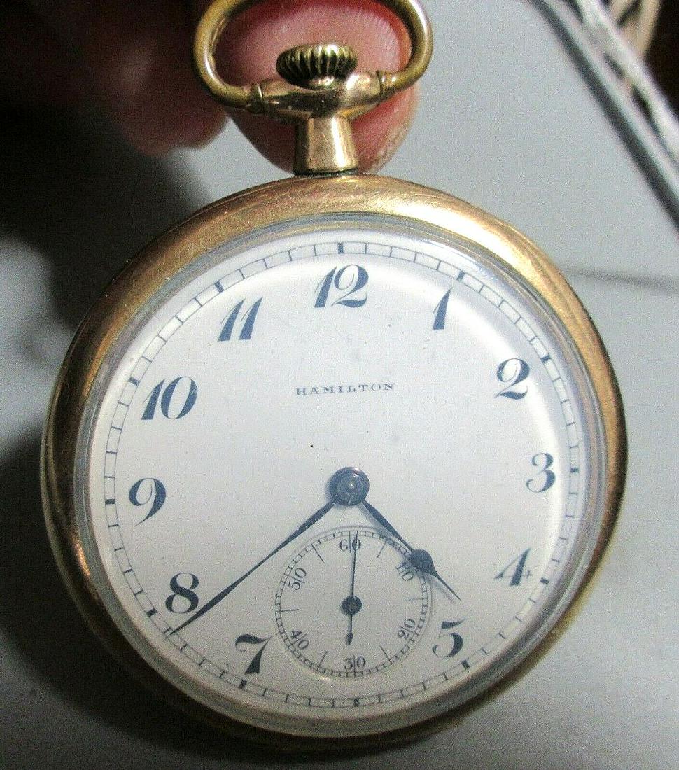 High Grade 23 jewel Hamilton 920 Railroad pocket watch: High Grade 23 jewel Hamilton 920 Railroad pocket watch. Porcelain dial in very good condition. Running at time of listing. Gold fill case with monogram initials on back. Please use photos for serial n