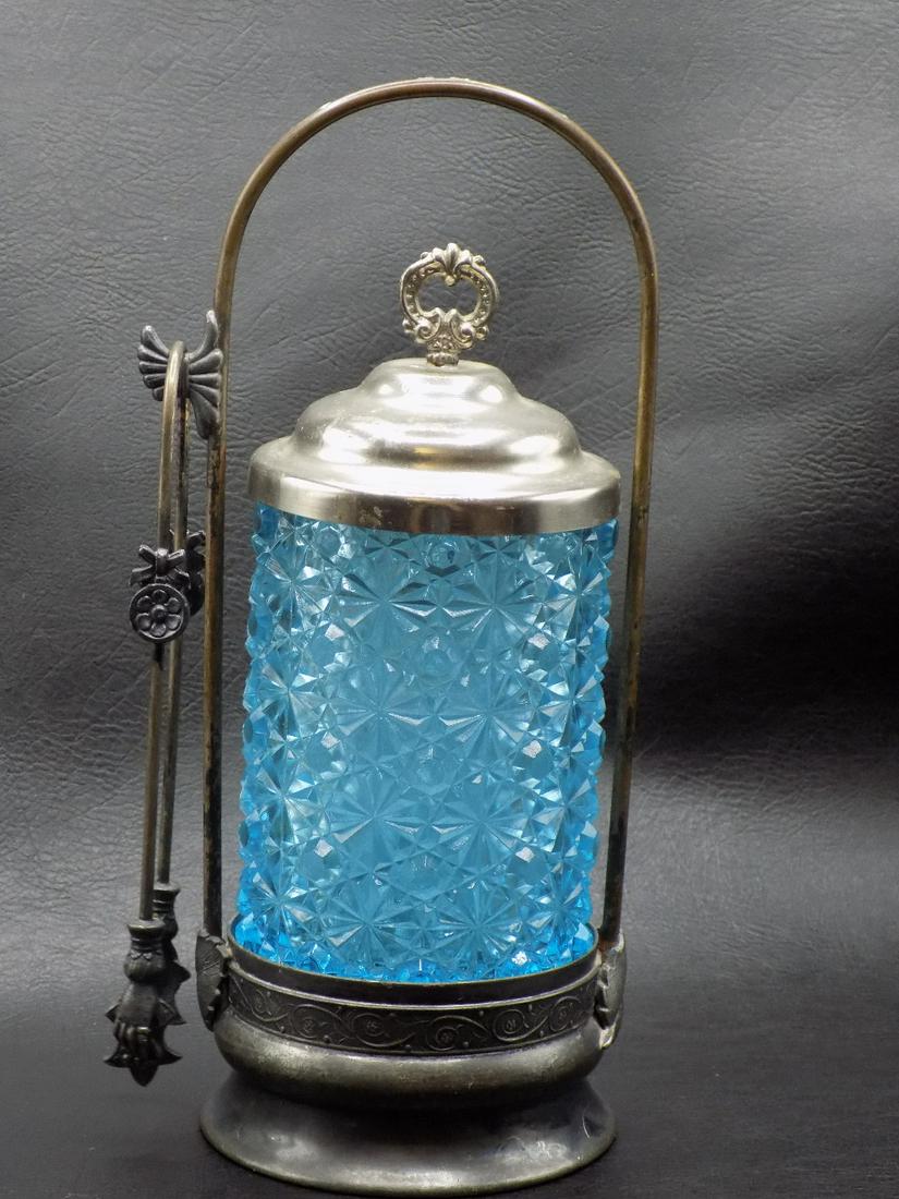 Beautiful Vintage Blue Art Glass Pickle Castor: Beautiful Vintage Blue Art Glass Pickle Castor. Unusual tong. Silverplate holder. In very good original as found condition. 9 ¾ inches tall