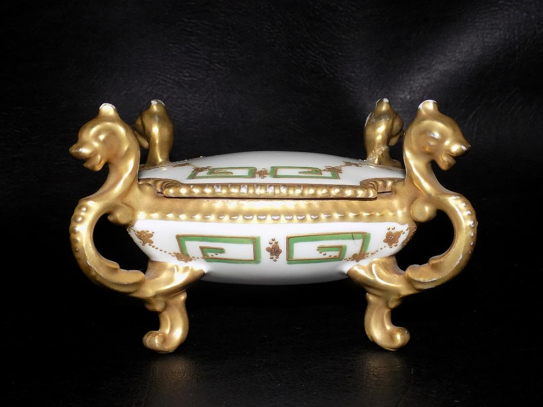 Vintage figural porcelain covered jewelry box. (1 of 6)