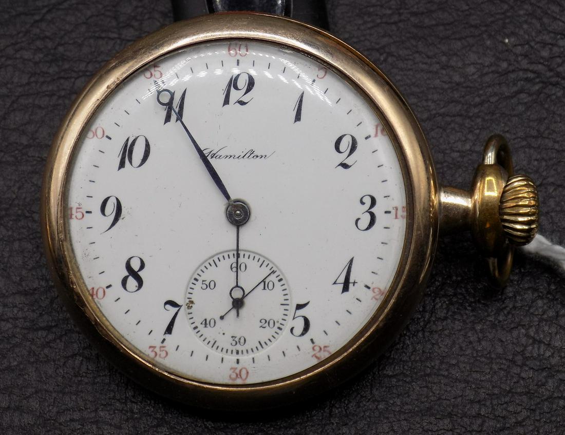 Fancy Antique Hamilton 975 engraved gold-filled pocket watch: Fancy Antique Hamilton 975 engraved gold-filled pocket watch. High grade. Very good original condition. 17 jewels and running. Porcelain dial. Great quality and detail. Measures 1 ¾ inches acro