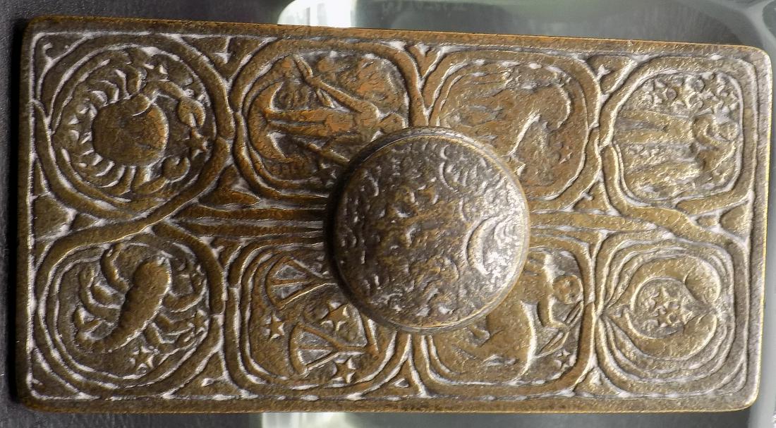 Lovely Signed Tiffany Bronze Zodiac ink blotter: Lovely Signed Tiffany Bronze Zodiac ink blotter. In very good original as found condition. Great quality and detail. Measures 5 ½ inches by3 5/8