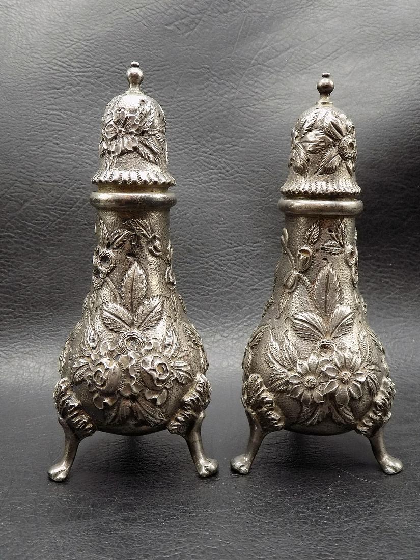 Ornate vintage S. Kirk and Son Inc. Repousse sterling salt and pepper shakers: Ornate vintage S. Kirk and Son Inc. Repousse sterling salt and pepper shakers. Great quality and detail. Marked on bottom as shown in photo. Monogram on bottom. 196 grams. 4 ¾ inches tall