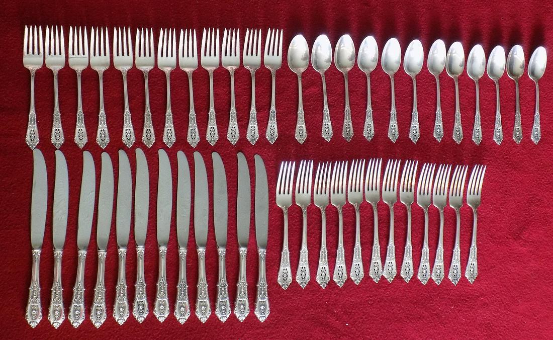 Elegant vintage 12 place setting Rose Point sterling flatware dinner set: Elegant vintage 12 place setting Rose Point sterling flatware dinner set. Great quality and detail. No monograms. Marked on back as shown in photo. Without knives 1292 grams. Total weigh Knives (stain