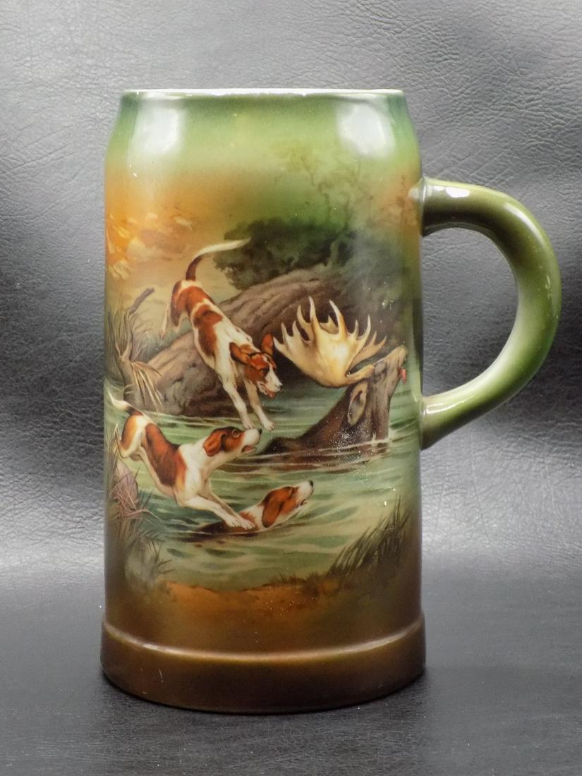Beautiful vintage Royal Bayreuth stein with hunting scene: Beautiful vintage Royal Bayreuth stein with hunting scene. Dogs chasing moose in river. Beautiful colors. Great quality and detail. In very good original as found condition. May have had a lid, as the