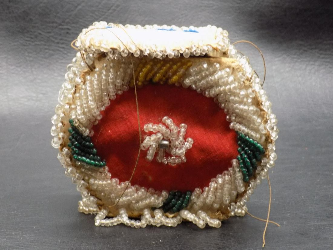 Good looking Antique Native American Indian beaded pouch: Good looking Antique Native American Indian beaded pouch. In good as found condition. Beautiful colors. Great quality and detail. Measures 3 inches by 4 inches