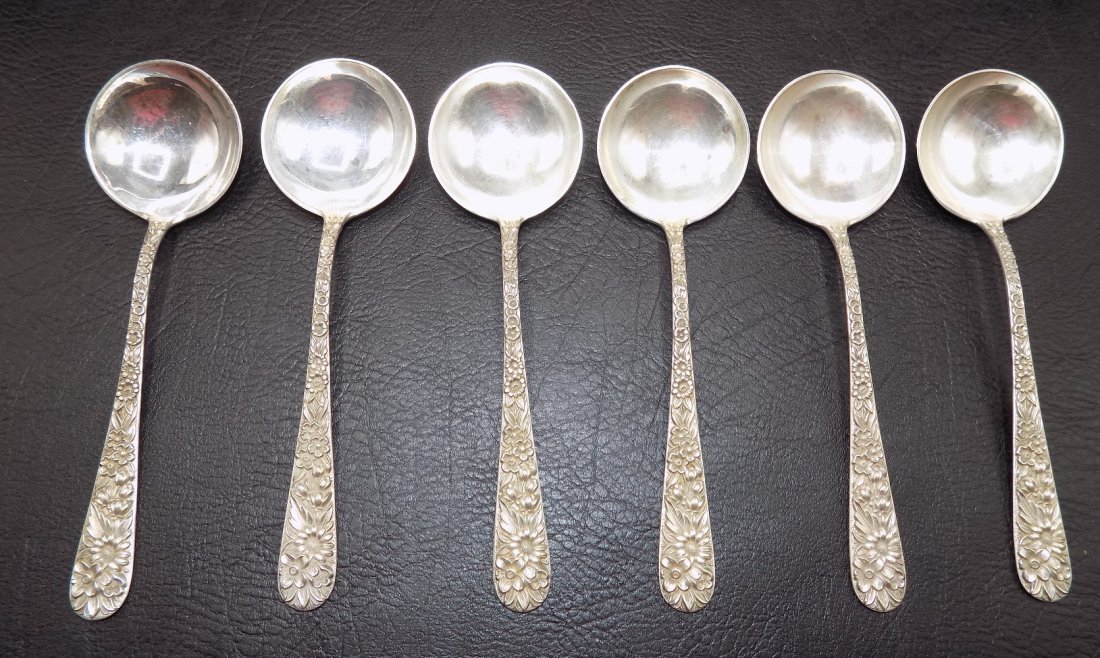 6 ornate vintage Kirk and Sons Repousse sterling bon bon or berry spoons.: 6 ornate vintage Kirk and Sons Repousse sterling bon bon or berry spoons. Great quality and detail. 5 1/4 inches. Marked on back as shown in photo. 156 gm