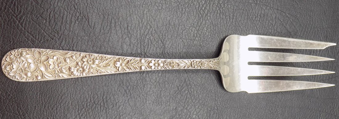 Ornate large vintage Kirk and Sons Repousse sterling meat fork: Ornate large vintage Kirk and Sons Repousse sterling meat fork. Great quality and detail. Marked on back as shown in photo. Monogram 68 gm. 8 ¼ inches. 70 gm