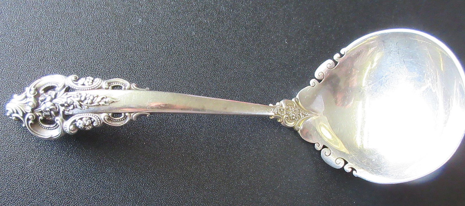 Elegant Vintage Grande Baroque Sterling Silver Ladle: Elegant Vintage Grande Baroque Sterling Silver Ladle. Marked sterling as shown in photos. Great quality and detail. In very good original as found condition. 74 grams. 6 ½ inches long