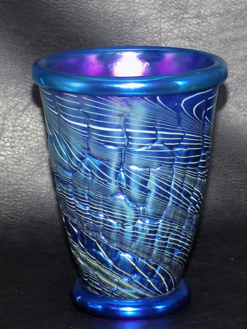 Wonderful Vintage Signed Orient and Flume Art Glass Vase: Wonderful Vintage Signed Orient and Flume Art Glass Vase. Artist signed and numbered on the bottom as shown in photos. Beautiful internal decoration and great iridescence. 5 7/8 inches tall x 3 ½