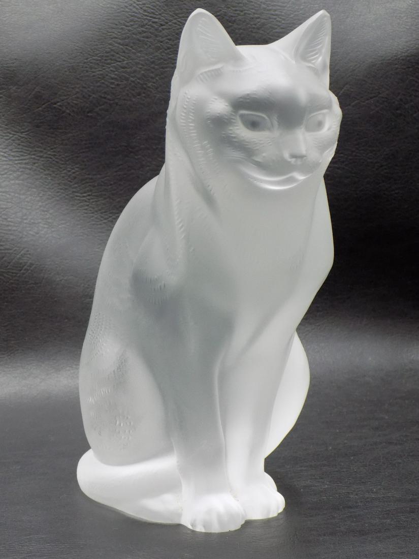 Delightful Vintaged signed Lalique 8 1/4 inch art glass cat.: Delightful Vintaged signed Lalique 8 1/4 inch art glass cat. Signed on bottom and paper label as shown in photos. Great quality and detail. In very good original as found condition. Weighs 7 lbs. 11 o