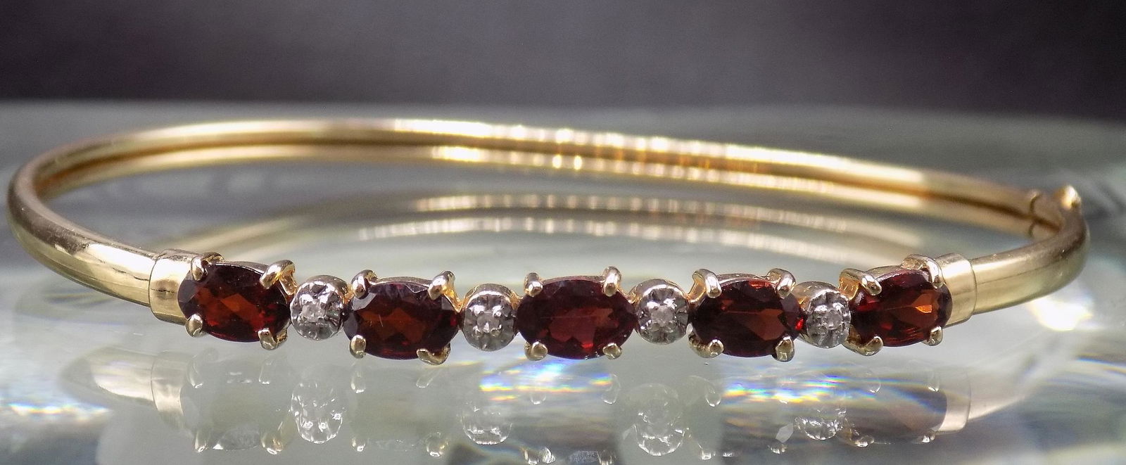 Beautiful garnet and diamond 10k gold bracelet. (1 of 5)