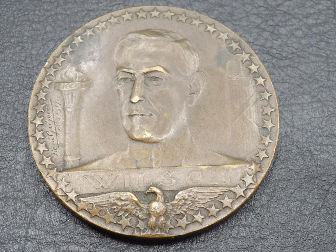 Antique WWI French bronze Woodrow Wilson medal: Antique WWI French bronze Woodrow Wilson medal. Artist signed as shown in photo. Marked bronze on side. In very good original as found condition. Great quality and detail. 2 inches x 1/8 thick
