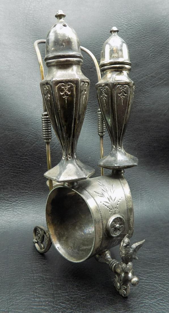 Ornate antique silverplate salt and pepper and napkin holder: Ornate antique silverplate salt and pepper and napkin holder. Bird on front. Great quality and detail. Not sure what small holder on back was used for. Carrier 6 5/8 inches tall x 2 ¼ wide x 3 &#