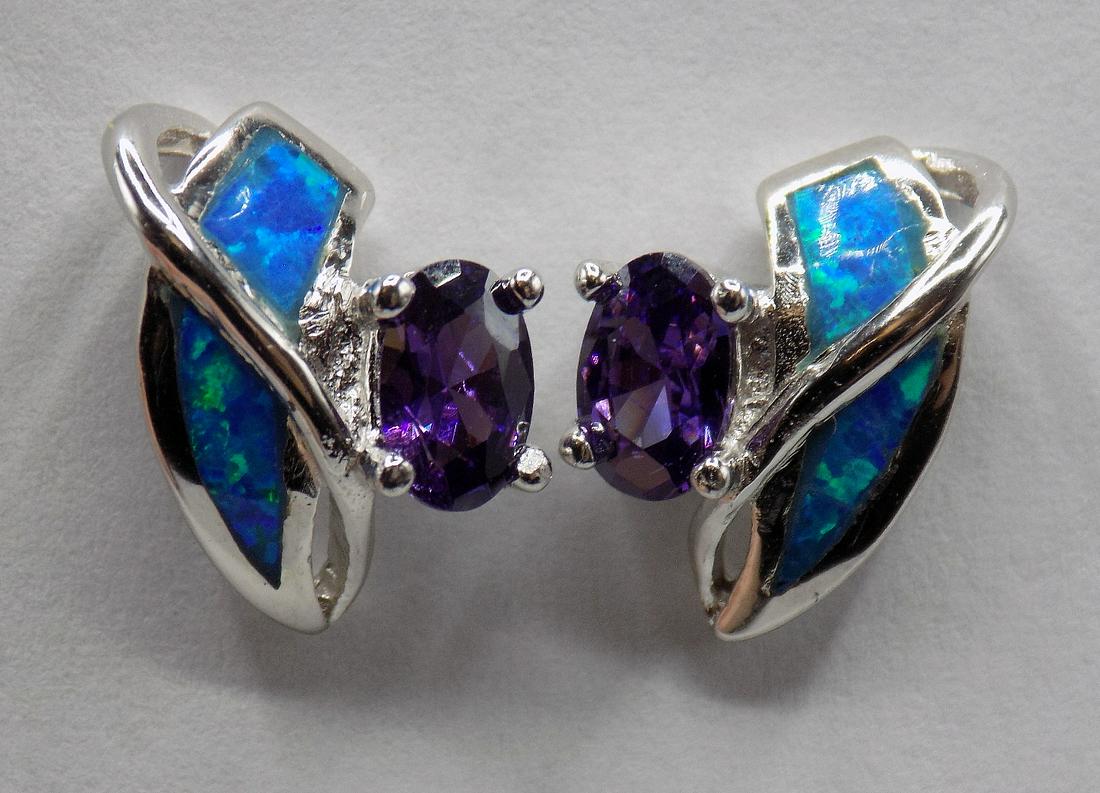 Beautiful 2 cwt. amethyst and Australian fire opal sterling silver earrings: Beautiful 2 cwt. amethyst and Australian fire opal sterling silver earrings . In very good original as found condition. Beautiful colors and detail. ½ inch long
