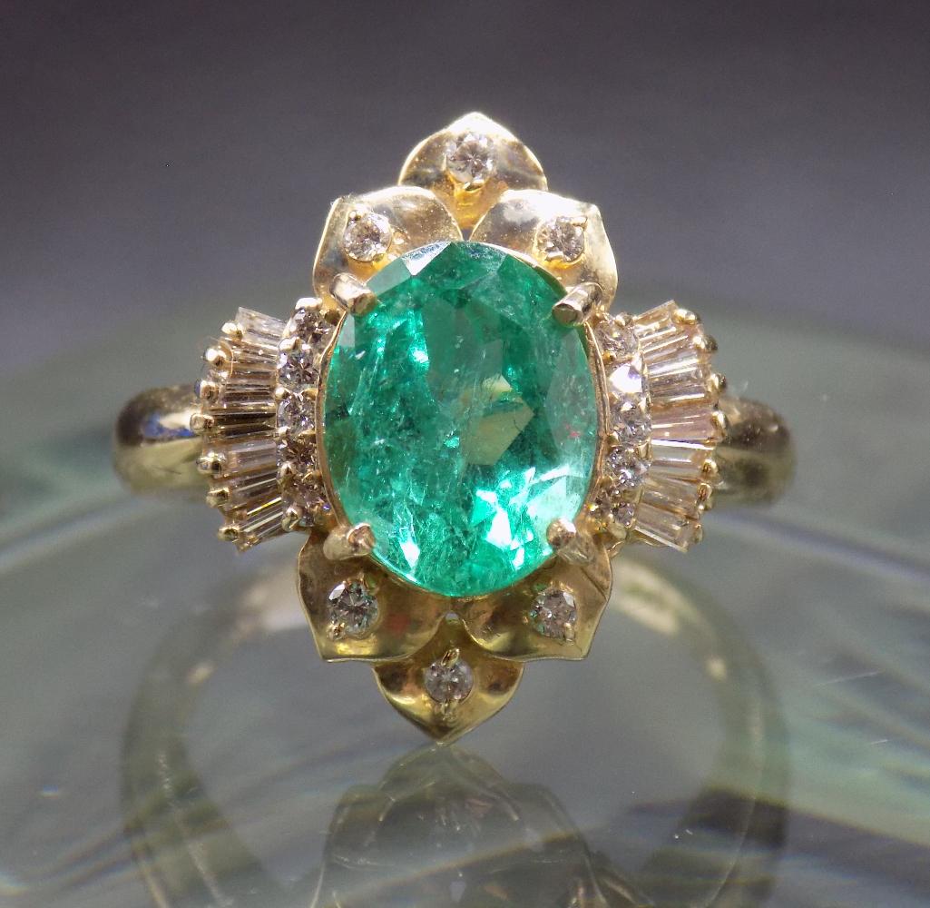 Splendid vintage emerald and diamond 14k gold ring: Splendid vintage emerald and diamond 14k gold ring. Approx 2 ct emerald. Round and baguette diamonds. Great quality and detail. Beautiful colors. Size 5 ½.