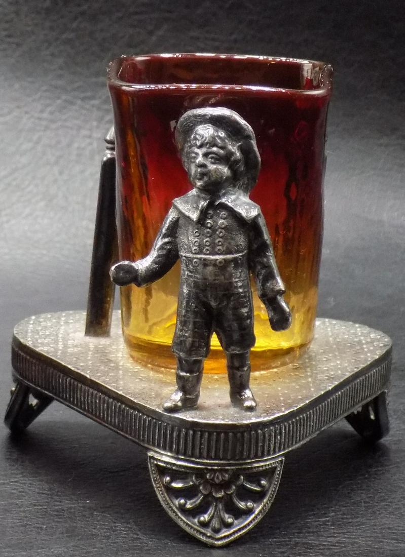 Rare Victorian Figural Amberina toothpick holder: Rare Victorian Figural Amberina toothpick holder. Marked James W Tufts Boston as shown in photo. Beautiful amberina art glass toothpick holder. Great quality and detail. 3 3/8 inches tall. 3 ½ in