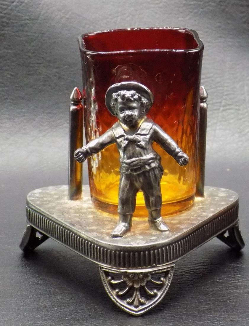 Rare Victorian Figural Amberina toothpick holder: Rare Victorian Figural Amberina toothpick holder. Marked James W Tufts Boston as shown in photo. Beautiful amberina art glass toothpick holder. Great quality and detail. 3 3/8 inches tall. 3 ½ in